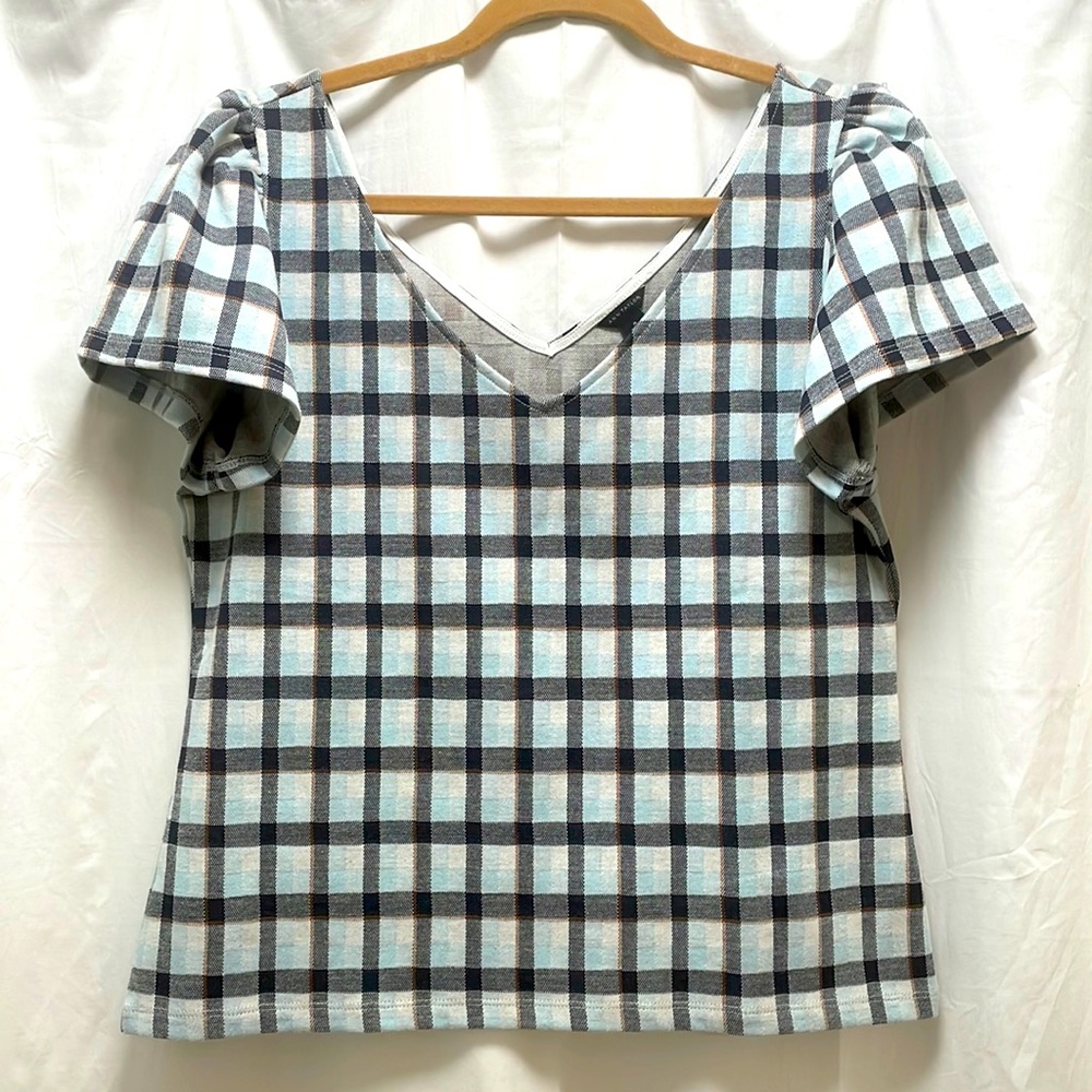 This is a beautiful top! Never worn it as it was a bit too low cut for my liking